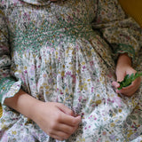 ANTOINETTE DRESS WITH WITH EVERGREEN HAND SMOCKING MADE WITH LIBERTY FIELD FLOWERS FABRIC