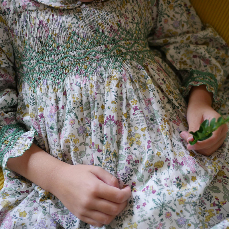 ANTOINETTE DRESS WITH WITH EVERGREEN HAND SMOCKING MADE WITH LIBERTY FIELD FLOWERS FABRIC