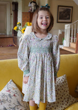 ANTOINETTE DRESS WITH WITH EVERGREEN HAND SMOCKING MADE WITH LIBERTY FIELD FLOWERS FABRIC